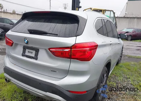 2020 BMW X1 xDrive28I из США, поврежденный, VIN WBXJG9C02L5P63499